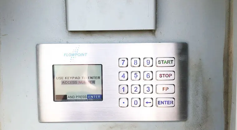 Flowpoint automated bulk water dispensing station with custom access panel Flowpoint automated bulk water system with custom access panel