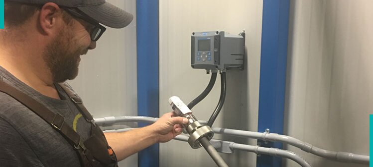 The Flowpoint team checks for safety measures on a septage management facility